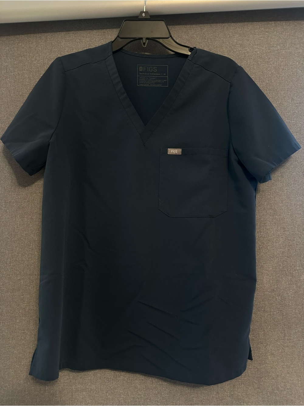 FIGS woman’s dark harbor Scrub Top